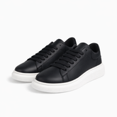 Minimal Black Leather Court Sneaker – White Heel Tab