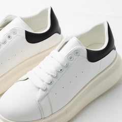Minimal White Leather Court Sneaker – Black Heel Tab